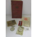 A WW2 Defence medal and a WW2 war medal with original box and supporting documentation including