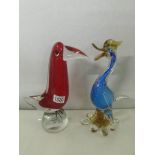 A heavy red glass Murano glass bird and a heavy blue glass Murano duck.