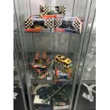 9 1960's Scalextric cars including Mini, Aston Martin etc, some with original boxes.