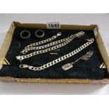 A collection of silver jewellery including necklace, rings, pendant etc.