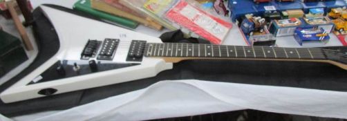A Gainer USA 'Flying V' electric guitar (with soft case).