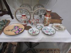 9 items of Chinese and Japanese ceramics including plates, teapot, vases etc.