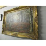 A gilt framed oil on canvas forest scene signed D A Everitt