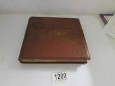 An Ogden's photo album containing 144 Ogden's 1901 series photo cards.