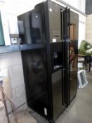 A large Samsung fridge freezer & cold drink dispenser