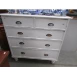 A 2 over 3 painted chest of drawers.