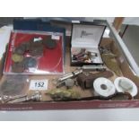 A mixed lot including Butlin's badges, coins, medallions, ARP whistles, mouth pieces,