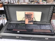 A Roland Solton MSI button key board work station synthesiser with flight case.