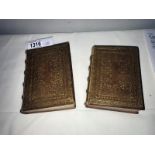 2 volumes of Tomola by George Elliot, copyright 1863.