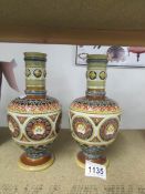 A pair of German vases with bulbous middles going in to neck,