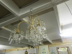 A 3 lamp chandelier.