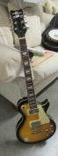 A Tobacco Sunburst Les Paul copy electric guitar, as new (plastic covers on pick ups, great action,