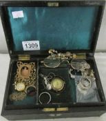 A jewellery box containing a mixed lot of jewellery, watches etc.