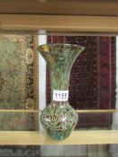 An Allum Bay (Isle of Wight) glass vase.