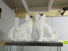 A pair of 19th century Staffordshire spaniels.