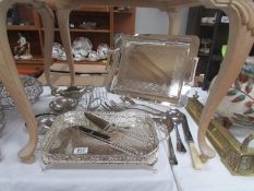 2 silver plated trays, toast racks, utensils etc.