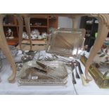 2 silver plated trays, toast racks, utensils etc.