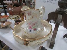 A floral decorated jug and basin set.
