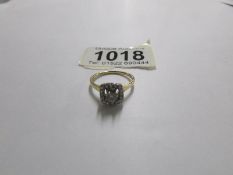 An 18ct diamond square shaped ring of three quarter carat, size M.