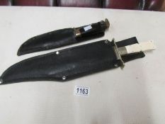 2 daggers in sheaths marked Samuel Peace and J.E.Middleton & Sons.