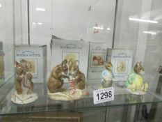 4 boxed Royal Albert Beatrix Potter figurines including Christmas Stocking, Johnny Town Mouse etc.