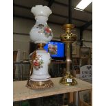A brass oil lamp base and and a ceramic table lamp base.