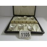 A cased set of 6 'golf club' silver teaspoons, Birmingham 1983.