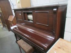 A Weber 'Pianola Piano', London with stool and box of music rolls.