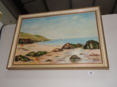 A framed beach scene.