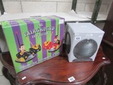 A boxed bumper cars game and one other.