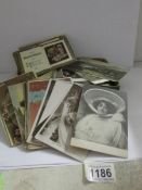 A quantity of old postcards.