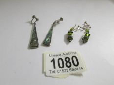 Two pairs of silver set vintage pendant earrings, one set with abalone shell.