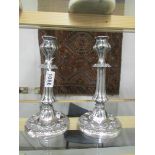 A pair of Georgian heavy silver plate / white metal candlesticks.