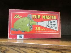 A boxed vintage 'Stipmaster' 35mm projector.