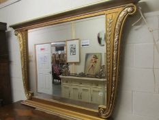 An ornate overmantel mirror Cappelletti Cantu' Italy