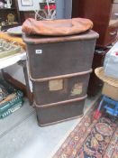 A cabin trunk and a leather bag.