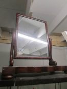 A Victorian mahogany swivel toilet mirror.