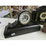 A black slate mantel clock, both springs ok but wound to limit, (no key).