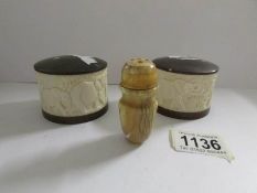 An early 20th century salt and pepper and an earlier ivory pepperette.