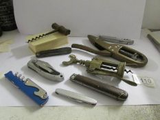 A mixed lot including bottle openers, pen knives, bone trnket box etc.