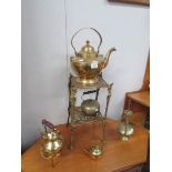 A mixed lot of brass ware including plant stand, trivet, large teapot etc.