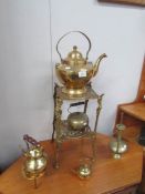 A mixed lot of brass ware including plant stand, trivet, large teapot etc.