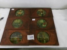 6 coloured magic lantern slides in wood frames.