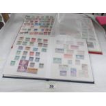 2 albums of assorted stamps.