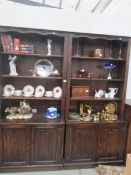 A pair of tall oak book cases.