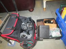 A quantity of camera's and lenses including vintage.