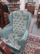 A wing arm chair.