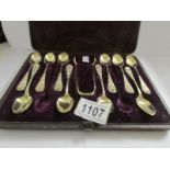 A cased set of silver tea spoons with sugar tongs, H.M Sheffield, Martin Hall & Co.