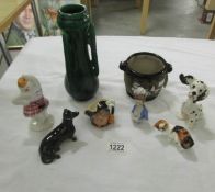 8 ceramic items including Beswick Dachsun, Beswick Dalmation, Royal Doulton Highland Snowman,