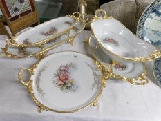 5 Maghsoud (Saudi Arabia) gilt and porcelain serving dishes.